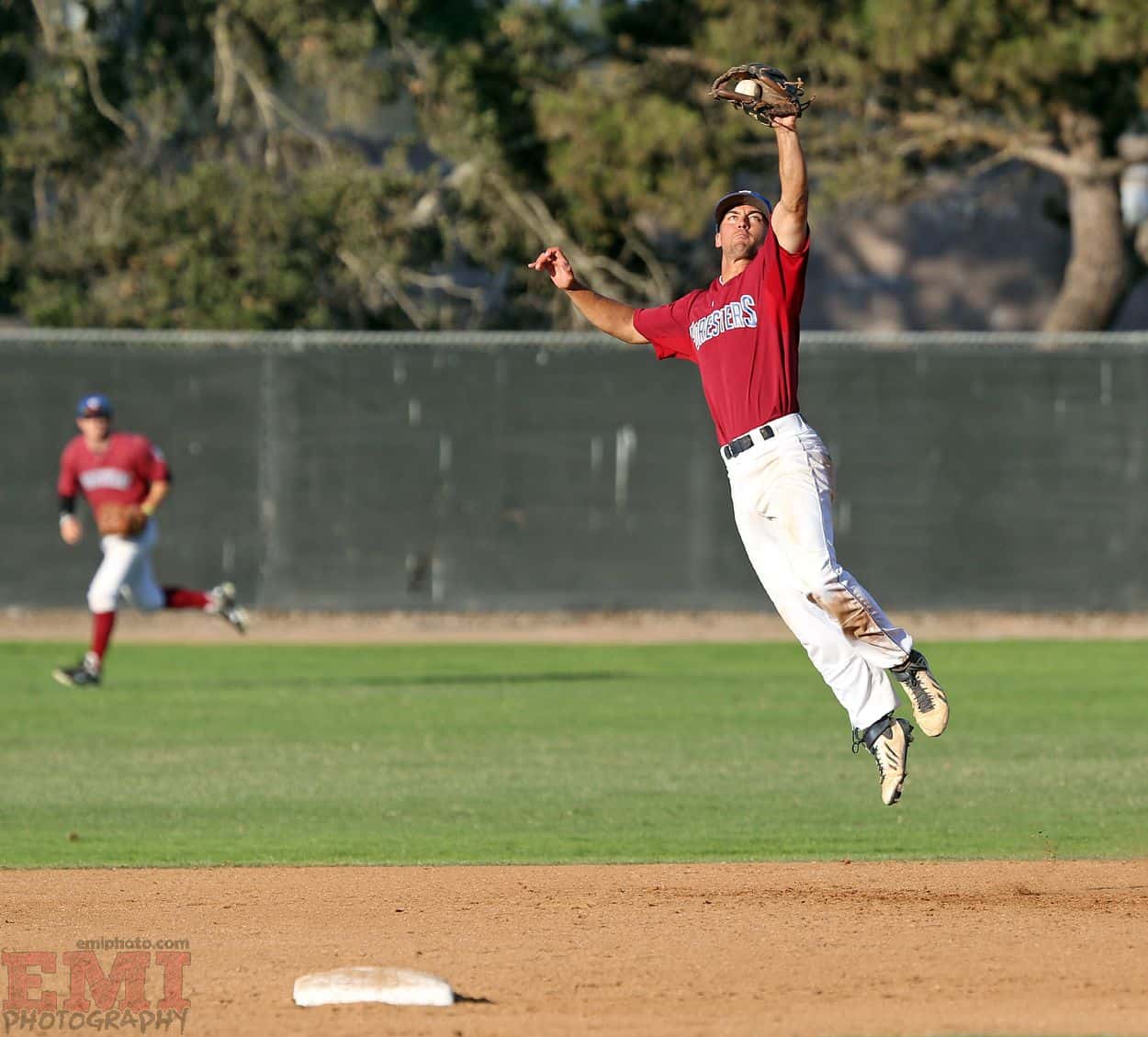 Player jumping to catch ball