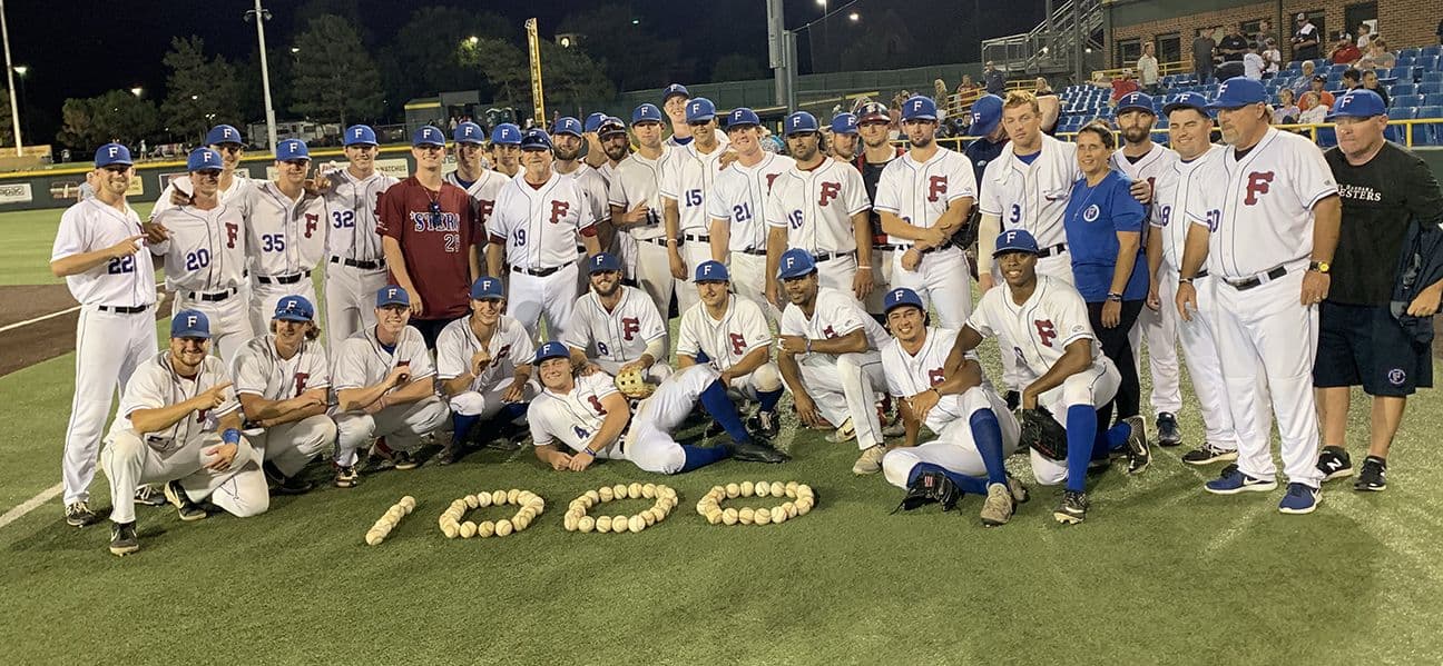 Players celebrating 1000th win