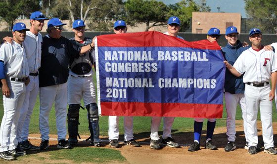 Players holding NBC Champions 2011 banner